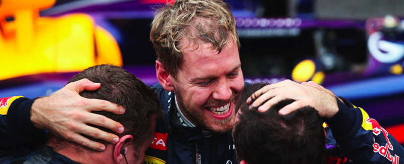 Vettel y Red Bull Premiados